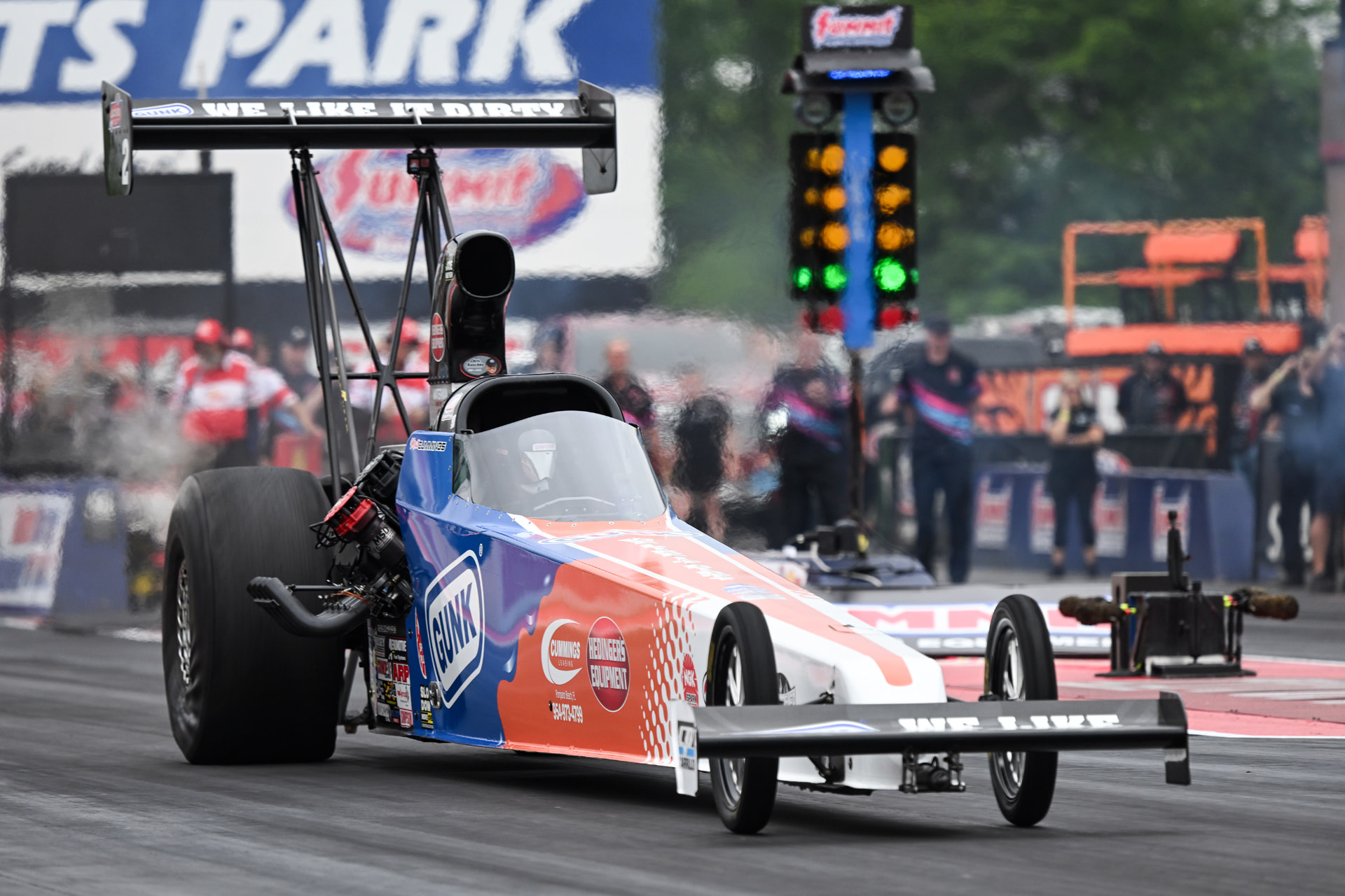 Megan's GUNK dragster launching down the drag strip